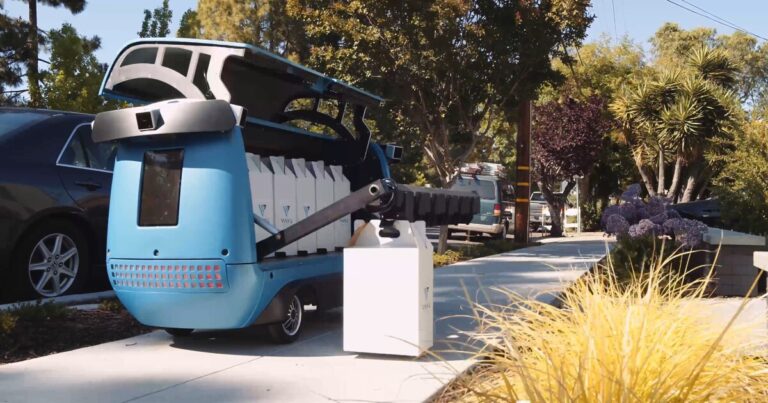 The new delivery robot loads up in the supermarket aisle and then rolls over to you